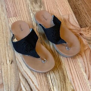 The Sak Black Crochet Thong Sandals with Tan Footbed